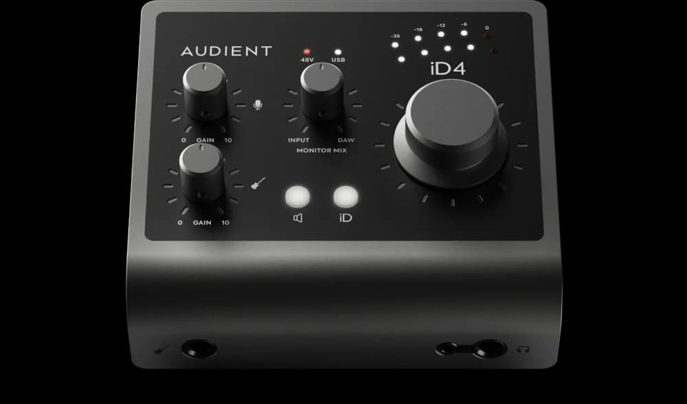 Audient iD4 MKII desktop interface with a large top-mounted volume knob and two front headphone sockets